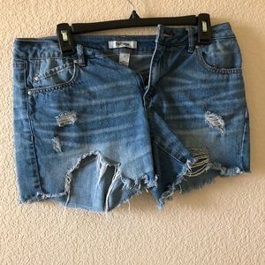 Blue jean shorts with rips
